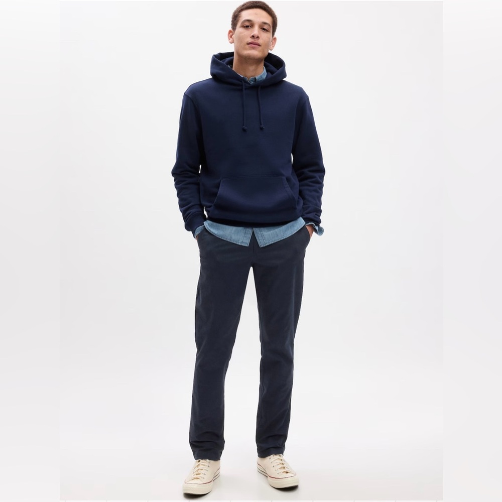 Modern Khakis (slim fit, navy blue). Brand new and never worn, but tags removed.